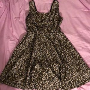 tight top flowy bottom dress